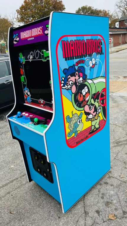 Mario Brothers, plays Super Mario Also, WITH LOTS OF NEW PARTS-LOOKS AND PLAY LIKE-HEAVY DUTY, COIN OPERATED, COMMERCIAL GRADE WITH FREE PLAY OPTION A NEW GAME-